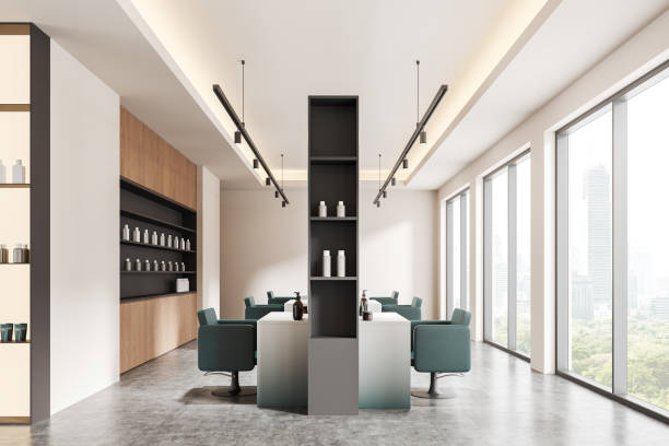 istock Stylish salon interior with armchairs, shelf with accessories and window 2181593860