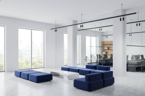 istock Stylish business interior with rest and coworking zone, panoramic window 2181594563