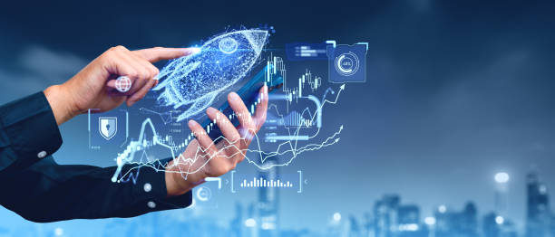 istock Businessman with phone finger touch rocket, forex statistics and graph chart 2181594732