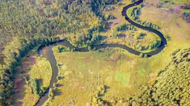 istock Steep bends and loops of the Merkys river, from above, Lithuania. 2181599761