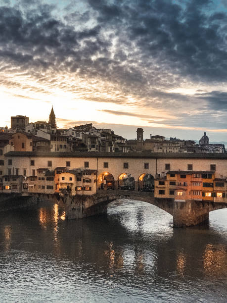 istock Florence skyline with ponte vecchio at dusk 2181599948