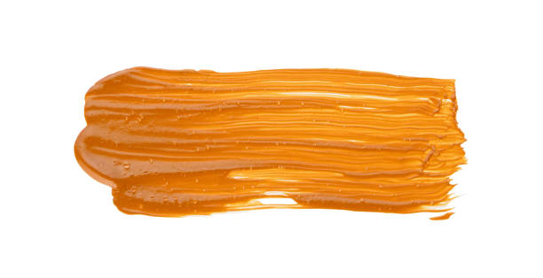 istock Rich orange paint stroke on a clean white background 2181602781