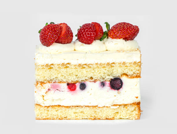 istock Delicious layered cake with cream and fresh strawberries displayed on a neutral background 2181603009