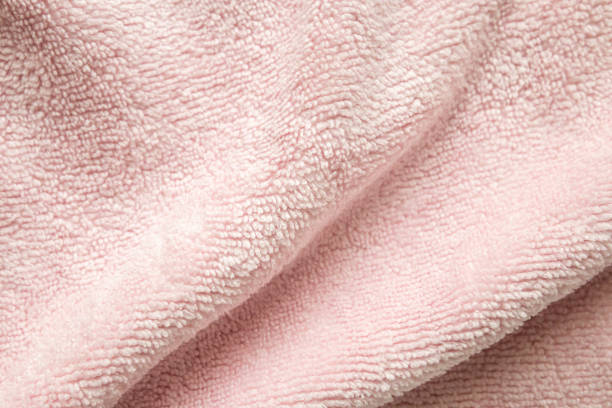 istock Pink fluffy towel fabric soft texture background 2181620226
