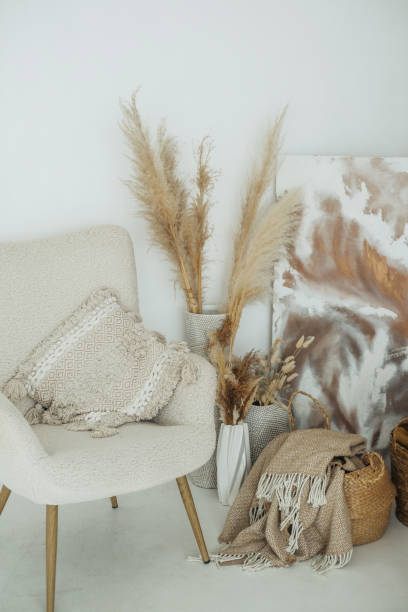 istock Cozy corner featuring textured decor with neutral tones and dried plants in a serene space 2181622210