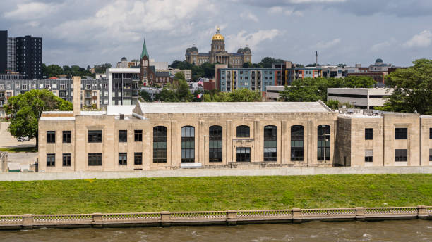 istock Dramatic skyline covers Des Moines waterfront with historic buildings. Iowa State Capitol, Capitol Hill Lutheran Church and diverse architecture feature background 2181626709