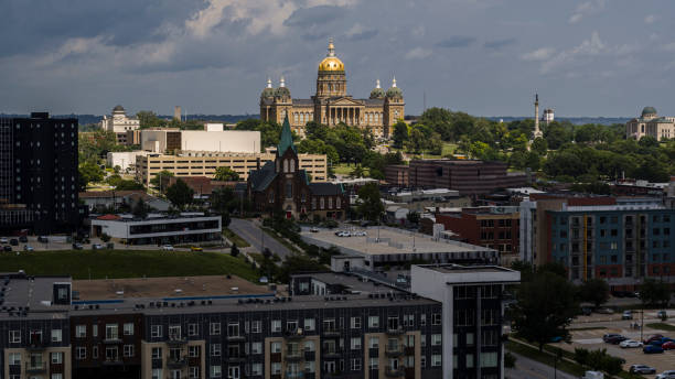 istock Midwest capital unveiled in pre-storm light. Des Moines skyline blends historic illuminated Iowa State Capitol before storm in Iowa 2181626721