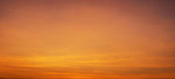 istock beautiful orange sky with a few clouds 2181635419