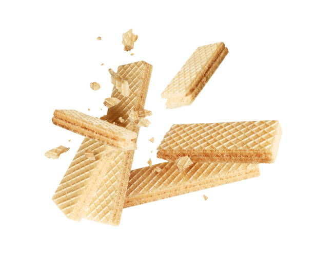 istock Crushed crispy waffles in the air isolated on white background 2181636189