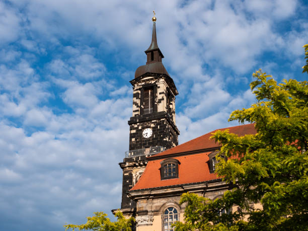 Annenkirche (Annen Church) building exterior in Dresden. Tower of the house of worship made of old and new sandstone bricks. Reconstructed structure in the city in Saxony.