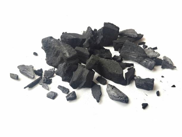 istock Pile of black coal isolated on white background 2181643780