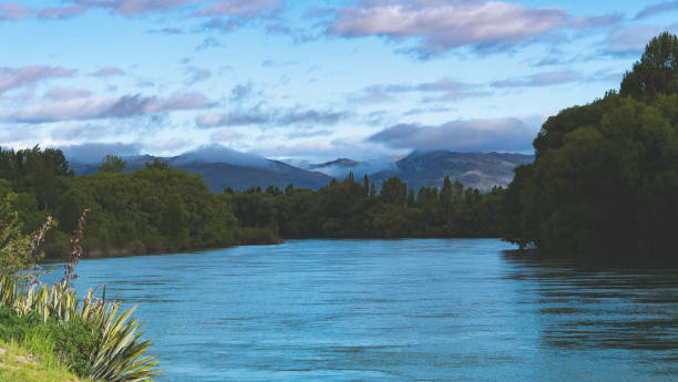 istock Clear blue water river with cloudy sky clear day gorgeous landscape 2181645043