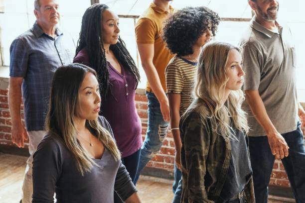 istock Diverse group of people standing together indoors. 2181649825