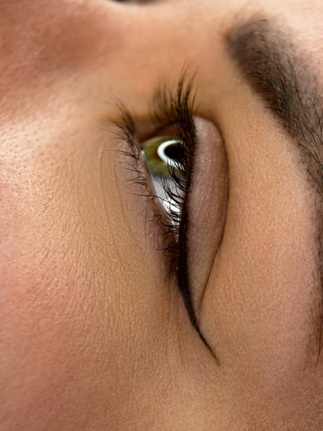 istock permanent make up , close up woman eye beautiful 2181653504