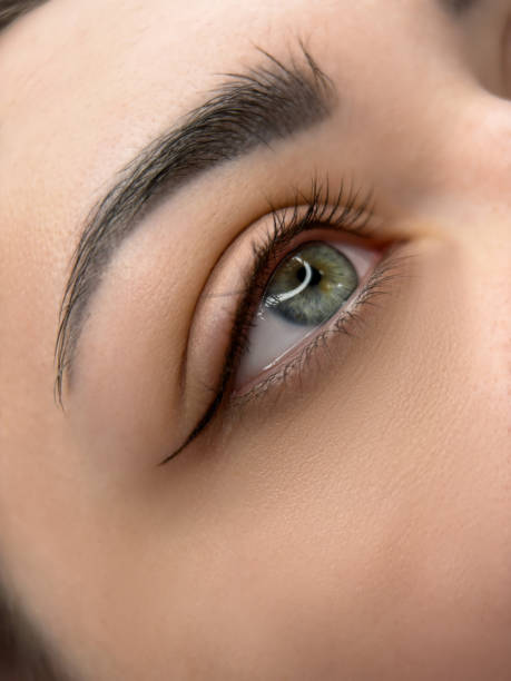 istock permanent make up , close up woman eye beautiful 2181653507