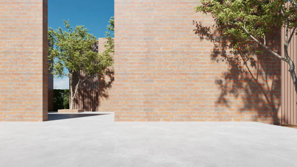istock Modern building exterior, curve architecture with large brick wall. concrete floor, 3d rendering 2181661896