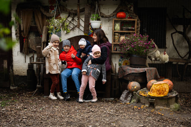 istock Family enjoying a rustic autumn day outdoors together 2181663836