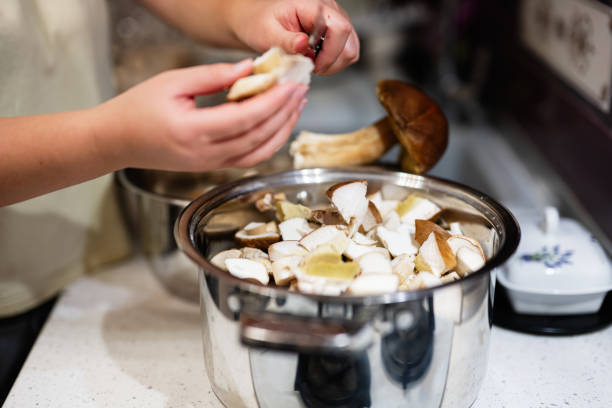 istock Preparing fresh mushrooms in a modern kitchen cooking environment 2181664518