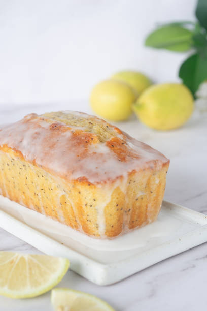 istock homemade lemon poppy seed pound cake on white ceramic tray. 2181664674