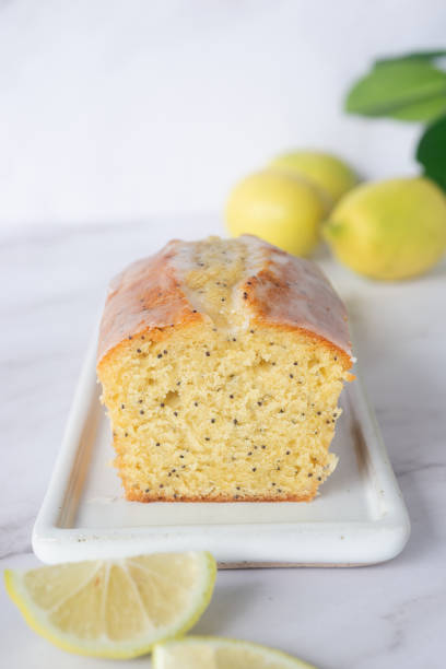 istock homemade lemon poppy seed pound cake on white ceramic tray. 2181664721