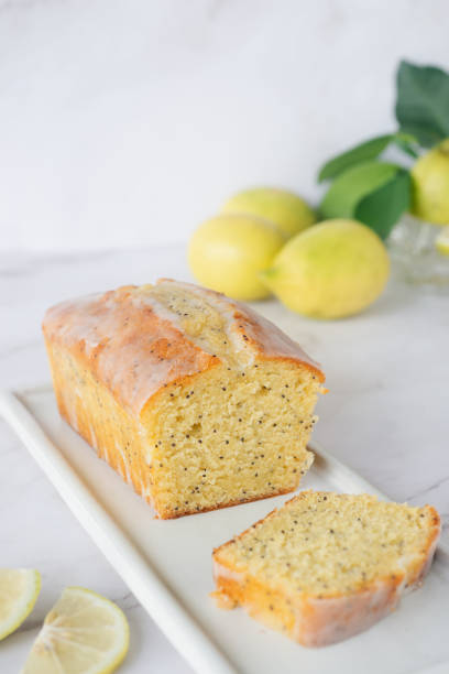 istock homemade lemon poppy seed pound cake on white ceramic tray. 2181664768