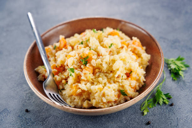 istock delicious creamy risotto with pumpkin and parmesan 2181665783