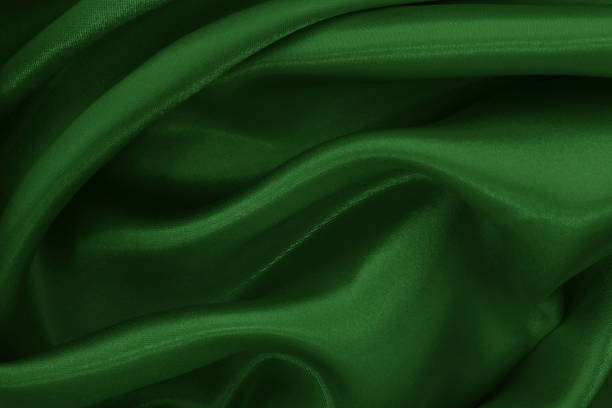 istock Dark green fabric cloth texture for background and design art work, beautiful crumpled pattern of silk or linen. 2181669190
