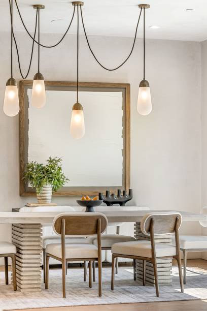 istock Modern dining room with elegant pendant lights. 2181669226