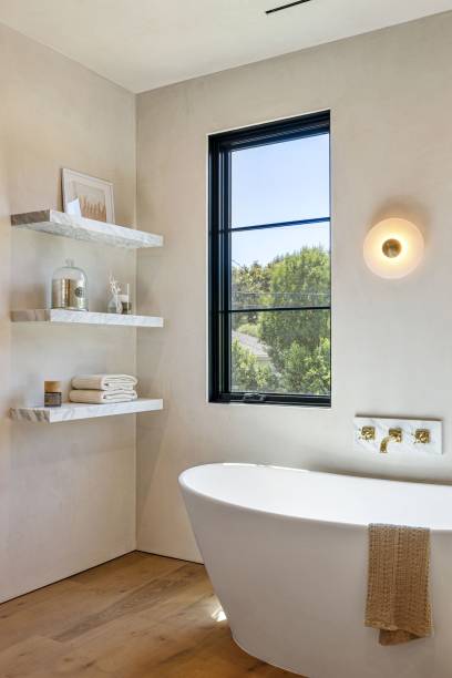 istock Modern minimalist bathroom with natural light. 2181669267
