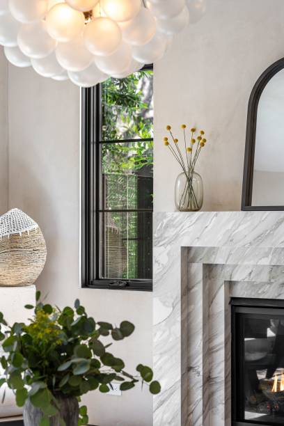 istock Modern interior with marble fireplace and elegant chandelier. 2181671686