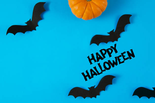 Halloween background with related objects and pumpkins