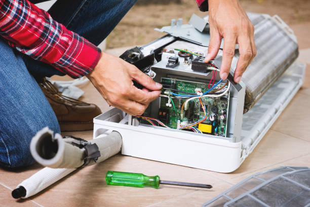 istock repairing the air conditioner 2181674349