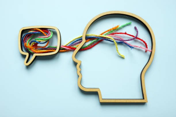 istock Speech bubble flowing into a head with colorful threads. Empathetic listening and emotional connection. 2181674896