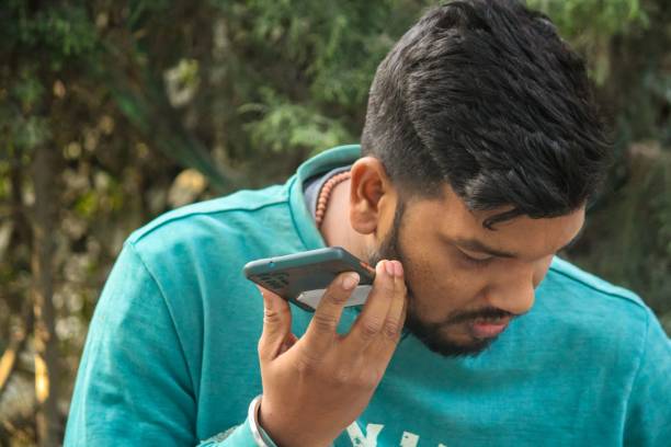 istock Man with dark hair and beard in turquoise sweater 2181679253