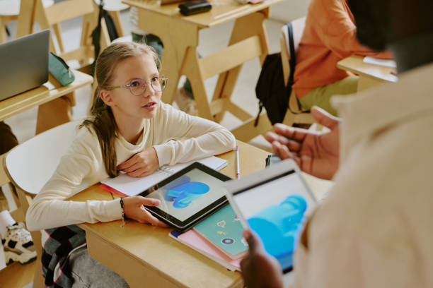 istock Young Girl Engaging in Classroom Learning with Tablet 2181680916