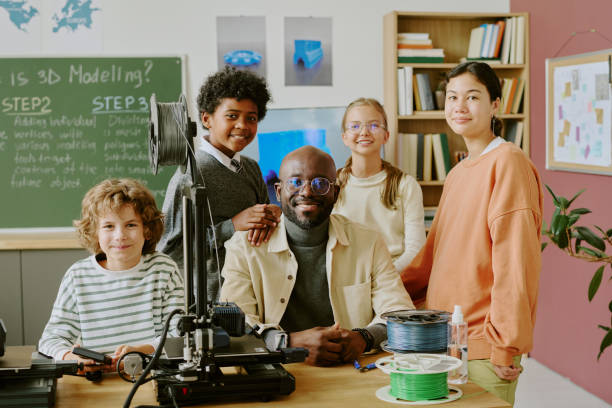 istock Group of Students and Teacher in Technology Classroom 2181683375