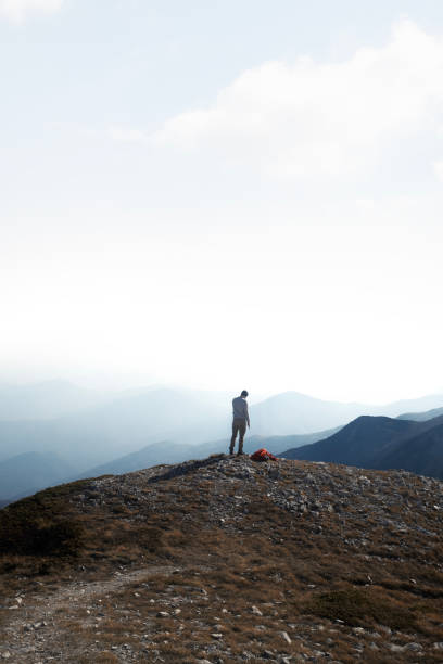 istock Lonely hiker on the mountain peak 2181686414