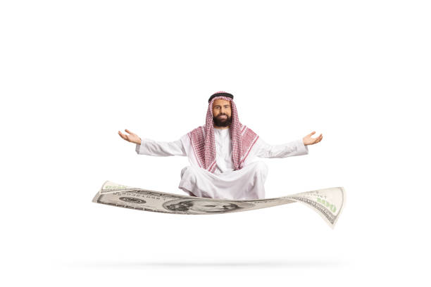 istock Saudi arab man floating on money 2181688088