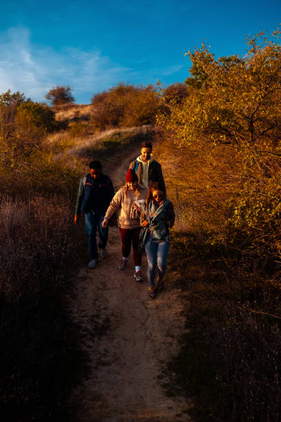 Colorado Springs, Colorado, USA - January 2, 2016: A group of men and women enjoy a winter afternoon walk in the Garden of the Gods city park.