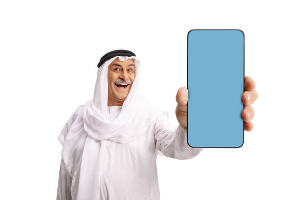 istock Traditional mature arab holding a smartphone 2181689064