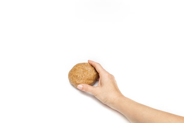istock Hand holding homemade oatmeal cookie dough 2181690171