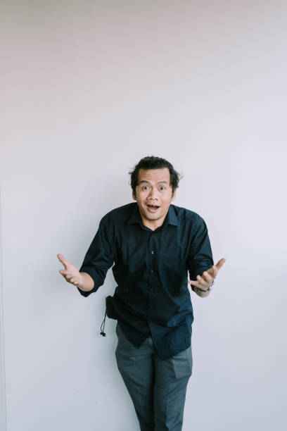 istock Southeast Asian man looking pensive and curious, with a questioning expression, 2181690276