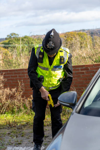 istock UK police officer holding a taser 2181691864