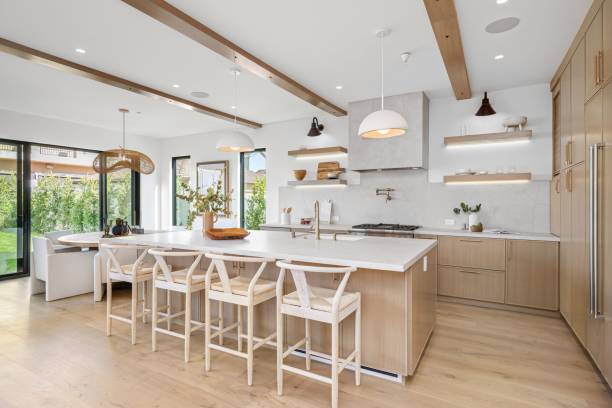 istock Modern kitchen with wooden cabinets and island 2181694061