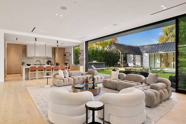 istock Modern open-plan living room with garden view. 2181694176