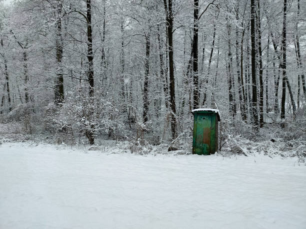istock A Snowy Landscape with a Remote Toilet 2181694998