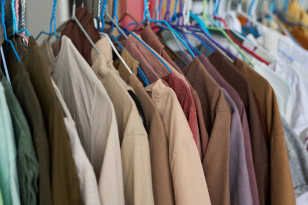 istock Row of hangers with casual apparel 2181696444