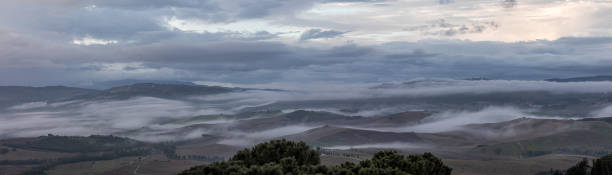 istock Panoramic Mist over the Val d'Orcia Hills, Tuscany 2181699383