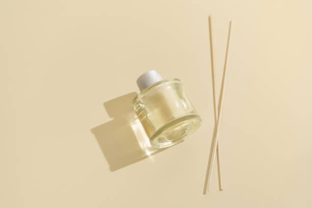 istock Aroma reed diffuser clear glass bottle for home and rattan sticks on beige isolated background. Decoration, hygge and aromatherapy concept. Incense sticks for the home. Image for your design 2181702061
