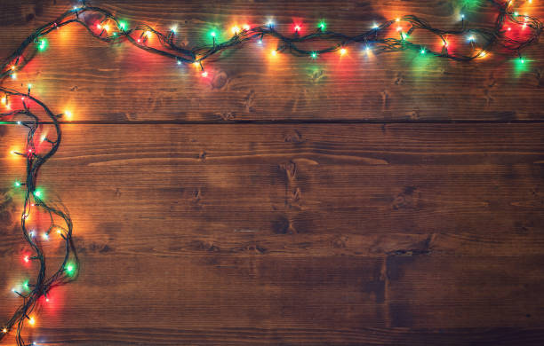 istock Empty rustic wooden background with Christmas lights 2181703683